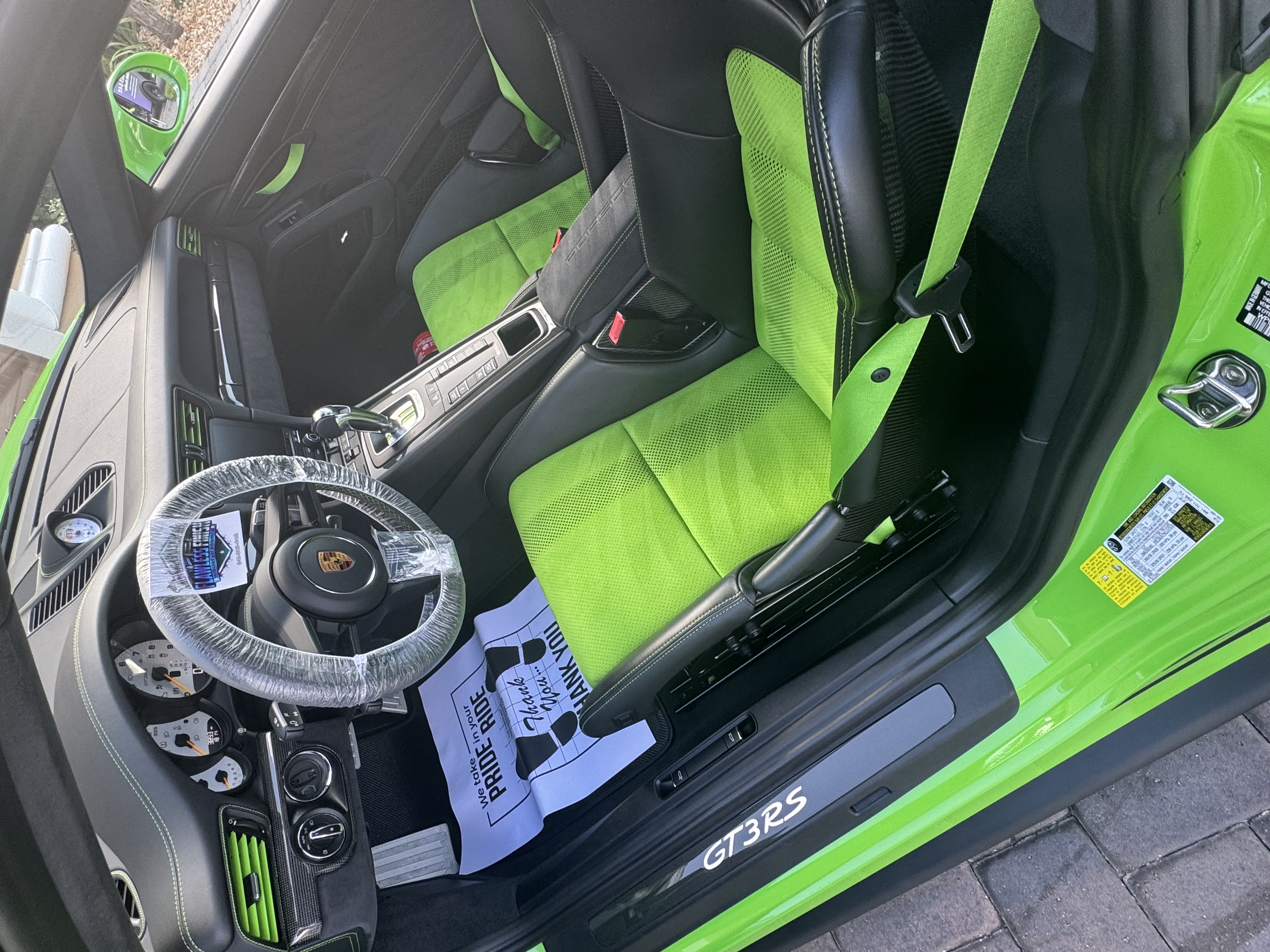 Lime green Porsche GT3 RS interior detailing - iconic green bucket seats